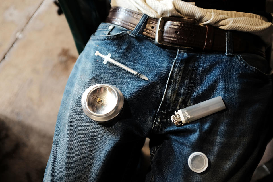 PHILADELPHIA, PA - JANUARY 24:  A man uses heroin under a bridge where he lives with other addicts in the Kensington section of Philadelphia which has become a hub for heroin use on January 24, 2018 in Philadelphia, Pennsylvania. Over 900 people died in 2016 in Philadelphia from opioid overdoses, a 30 percent increase from 2015. As the epidemic shows no signs of weakening, the number of fatalities this year is expected to surpass last year's numbers. Heroin use has doubled across the country since 2010, according to the DEA, part of an epidemic. Officials from Philadelphia recently announced that they want to become the first U.S. city to allow supervised drug injection sites as a way to combat the opioid epidemic.  (Photo by Spencer Platt/Getty Images)