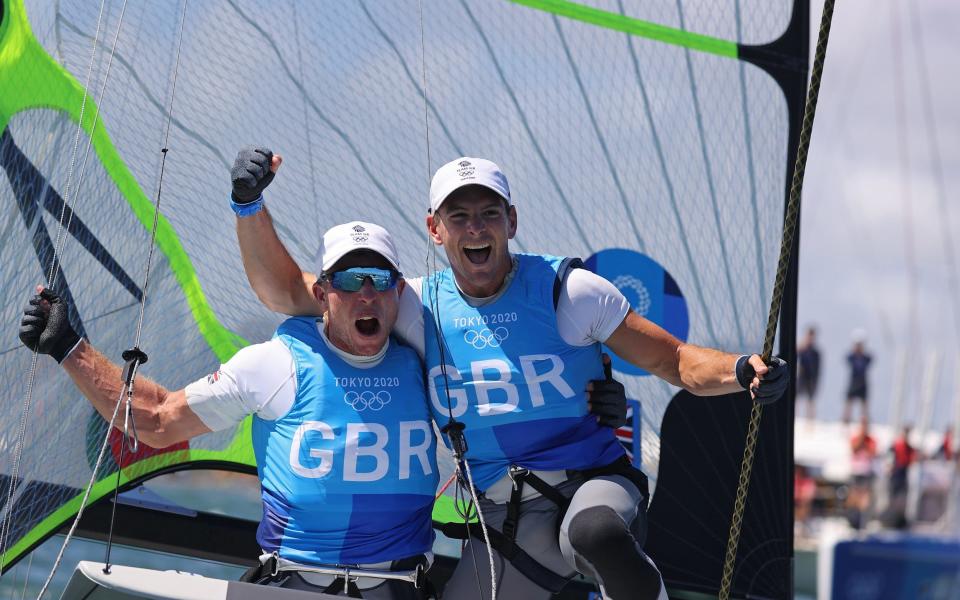 Dylan Fletcher and Stuart Bithell celebrate their thrilling gold medal victory - REUTERS