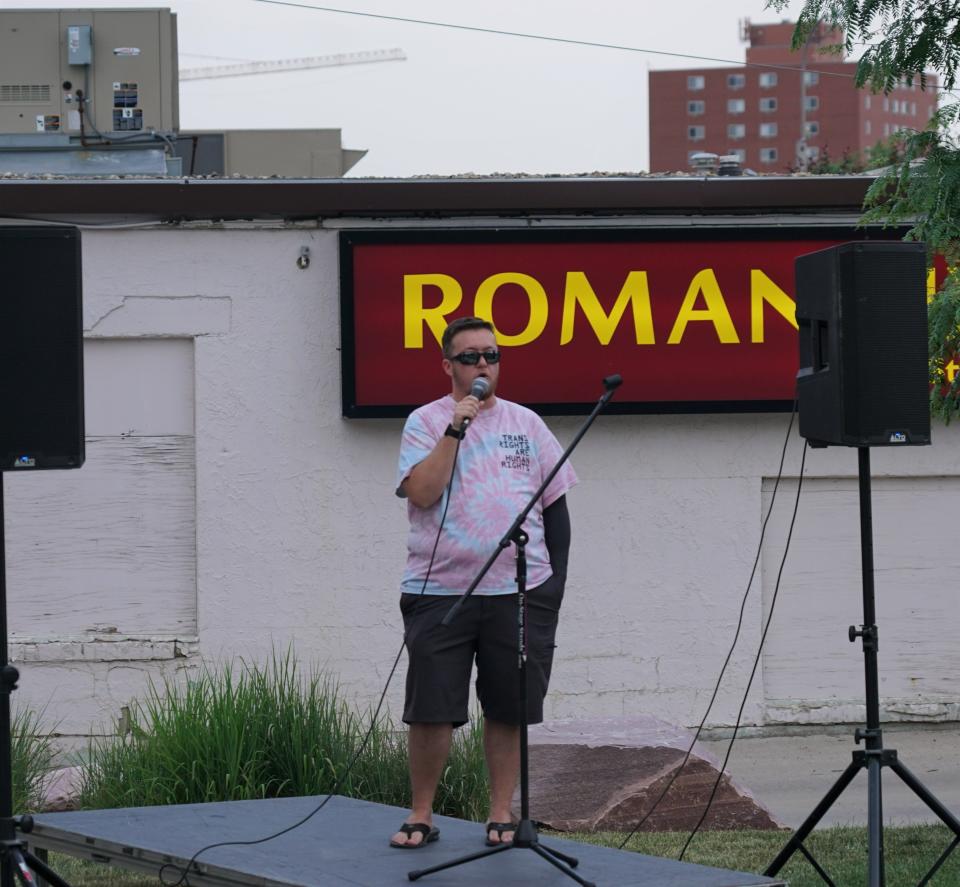 Jack Fonder, a community health worker at the Transformation Project and transgender man, speaks a rally for transgender rights at Van Epps Park in Sioux Falls on Wednesday, June 7, 2023.