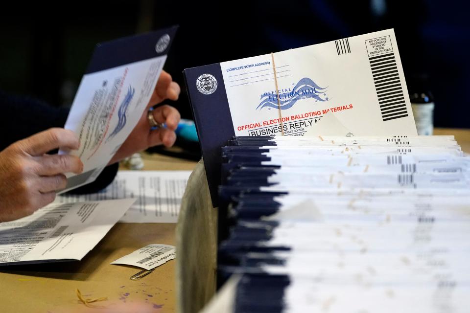 Chester County, Pa. election workers process mail-in and absentee ballots at West Chester University in West Chester on Nov. 4, 2020. Law enforcement agencies, civil defense officials and election administrators have begun meeting in Pennsylvania to coordinate how they will identify and fight election threats with the presidential contest just eight months away in the battleground state, Gov. Josh Shapiro’s administration said Thursday, Feb. 29, 2024.