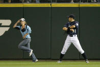 Right fielder Ichiro Suzuki #51 of the Seattle Mariners watches as a fan runs onto the field during the game against the New York Yankees on August 14, 2009 at Safeco Field in Seattle, Washington. (Photo by Otto Greule Jr/Getty Images)