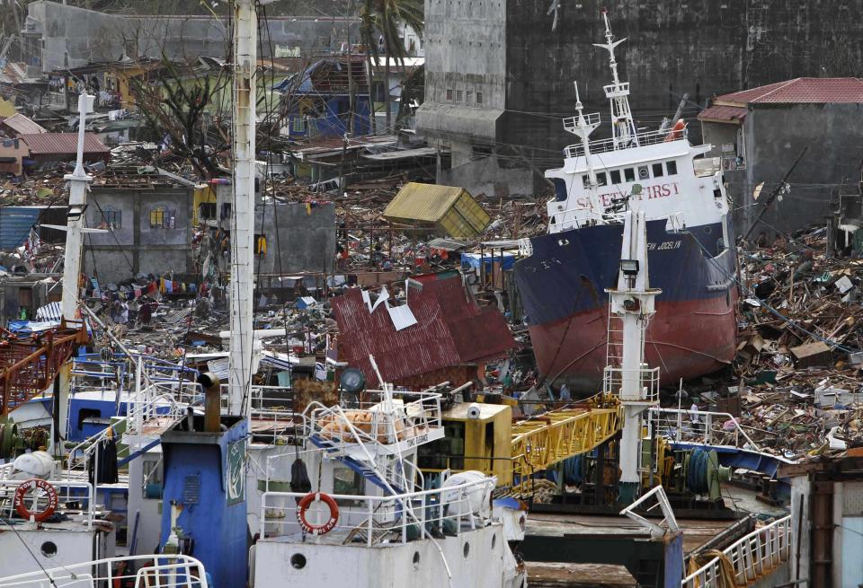 Cargo ships washed ashore are seen after super typhoon Haiyan hit Tacloban