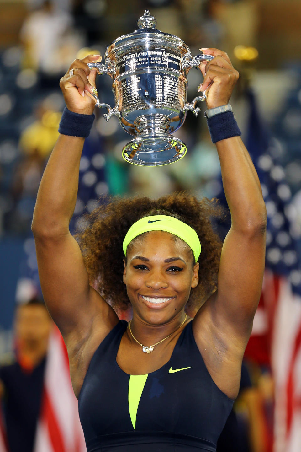 Serena Williams of the United States lifts the championship trophy after defeating Victoria Azarenka of Belarus to win the women's singles final match on Day Fourteen of the 2012 US Open at USTA Billie Jean King National Tennis Center on September 9, 2012 in the Flushing neighborhood of the Queens borough of New York City. (Photo by Al Bello/Getty Images)