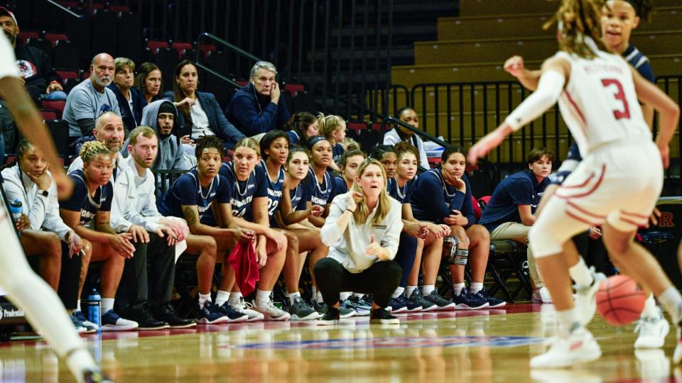 Monmouth women's basketball coach Ginny Boggess watches her team from in front of the bench during the Hawks' 56-51 loss to Rutgers on Nov. 6, 2023 in Piscataway.