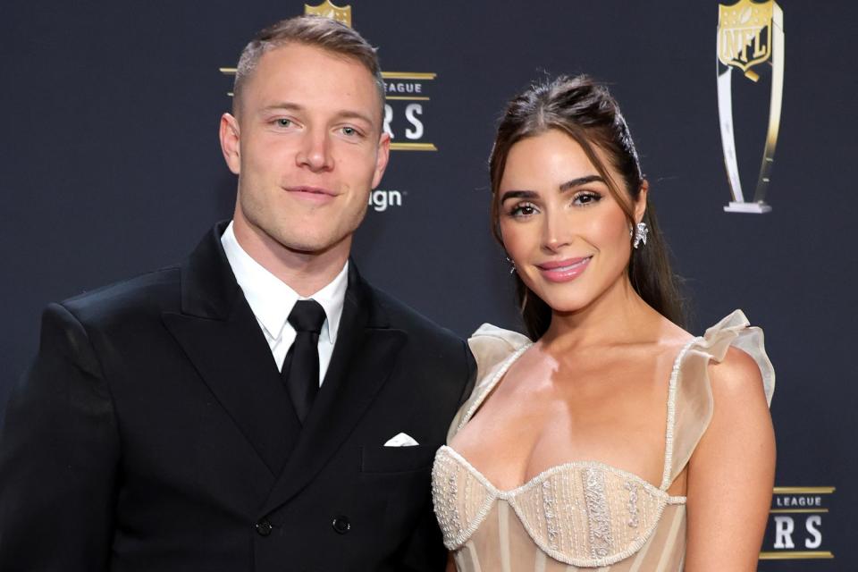 <p>Ethan Miller/Getty</p> Christian McCaffrey and Olivia Culpo attend the 12th annual NFL Honors at Symphony Hall on February 9, 2023