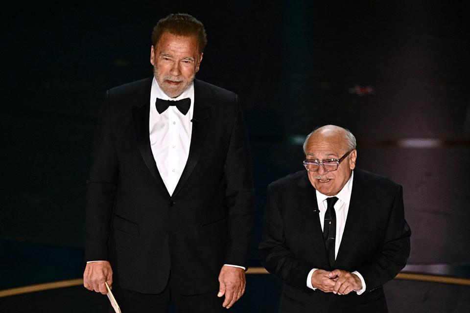 <p>PATRICK T. FALLON/AFP via Getty</p> Arnold Schwarzenegger and Danny DeVito on March 10, 2024