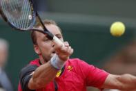 Tennis - French Open - Roland Garros - Novak Djokovic of Serbia vs Steve Darcis of Belgium Paris, France - 26/05/16. Darcis returns the ball. REUTERS/Gonzalo Fuentes