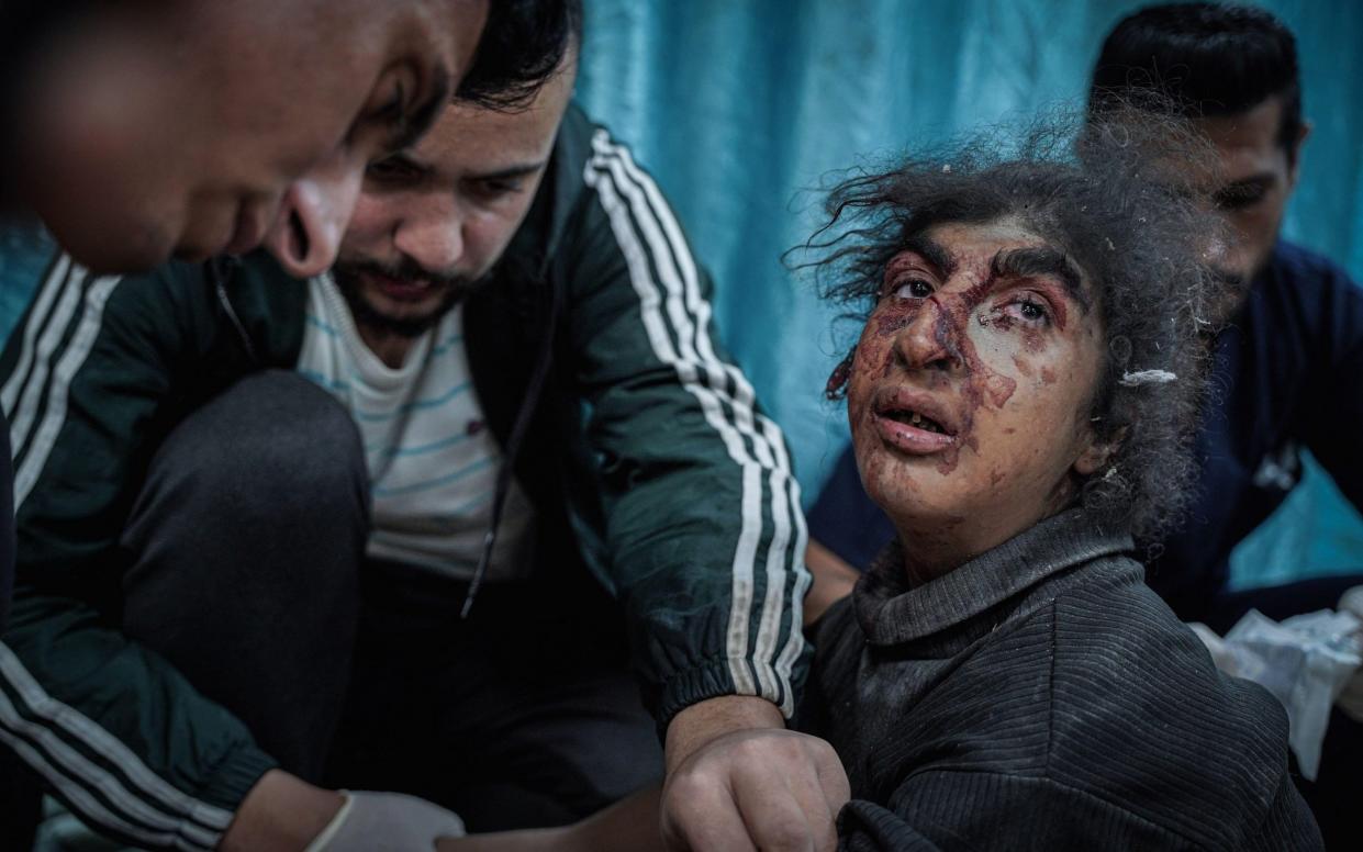 An injured child receiving first aid