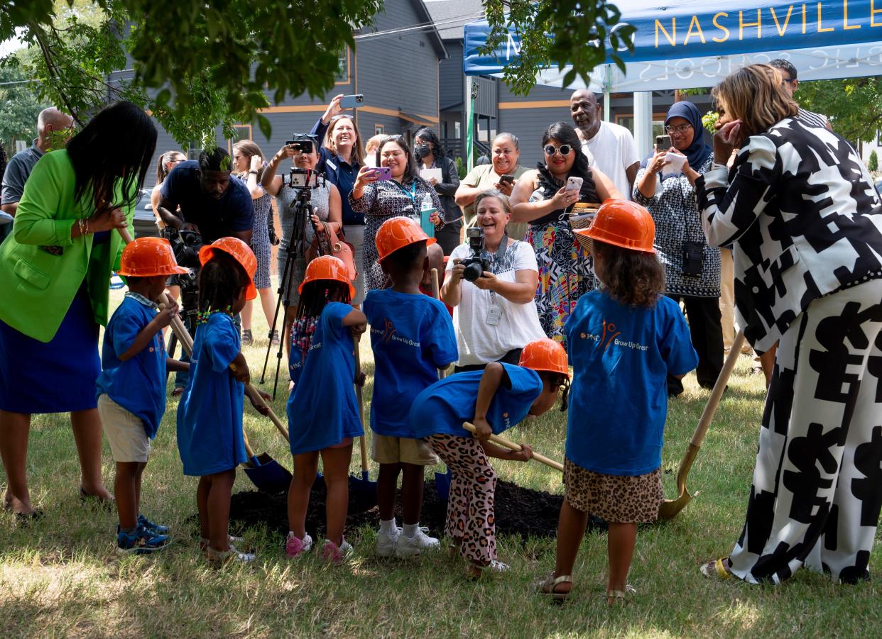 Napier Elementary School pre-K students flip the symbolic dirt to kick off the creation of the Storybook Trail during the groundbreaking ceremony at Napier Elementary School in Nashville, Tenn., Thursday, Aug. 29, 2024. The Metro Nashville Public Schools say this will help kids learn through outdoor play and "The Little Red Hen" and "The Three Little Pigs" will figure prominently in the design.