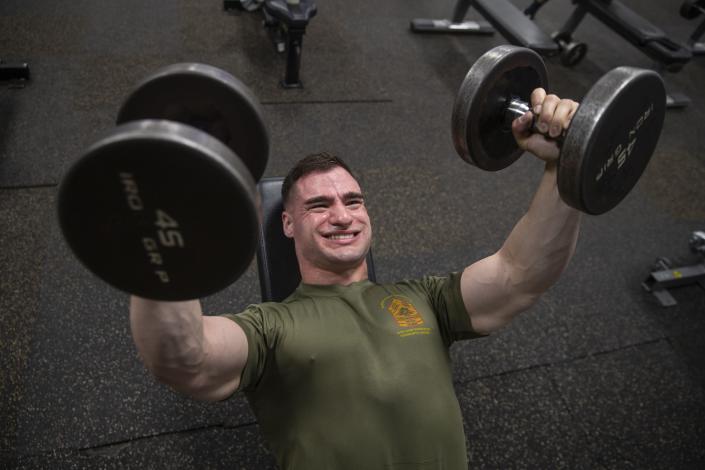 A Marine lifts weights at Marine Corps Air Station Cherry Point, North Carolina, Feb. 19, 2020. (Cpl. Damaris Arias/ Marine Corps)