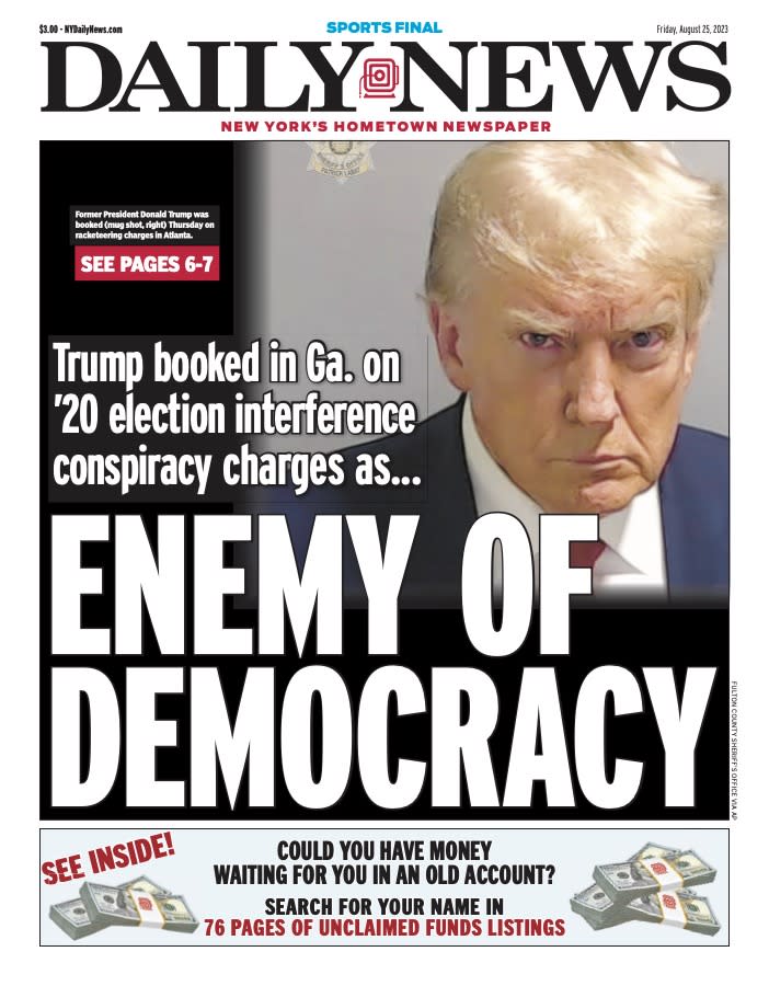 The front page of New York's Daily News, with Donald Trump's mug shot and the words Enemy of Democracy.