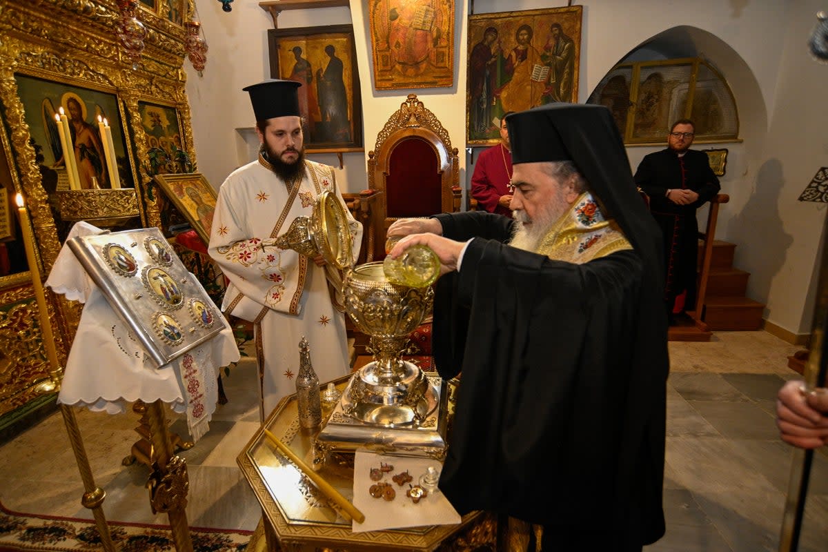 Oils from the Mount of Olives being mixed with essential oils and blessed in Jerusalem by the Patriarch of Jerusalem, His Beatitude Patriarch Theophilos III, to become Chrism Oil, which will be used in the coronation of King Charles (Patriarchate of Jerusalem/Buckingham Palace/PA) (PA Media)