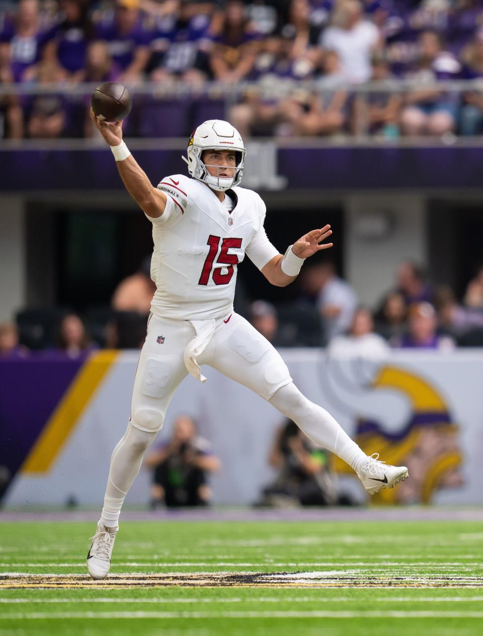Arizona Cardinals quarterback Clayton Tune (15) throws a pass against the Minnesota Vikings in the first quarter at U.S. Bank Stadium in Minneapolis on Aug. 26, 2023.