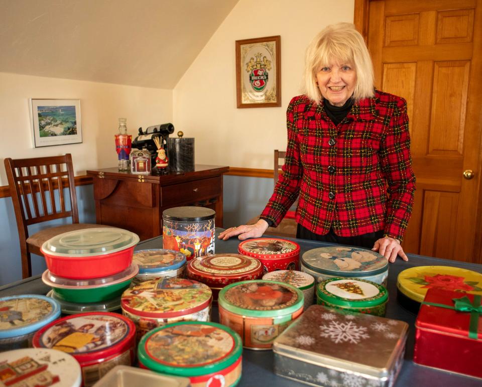 Linda Friedman has a large collection of tins she uses to gift holiday cookies. She has been donating to the T&G Santa Fund since 1978.