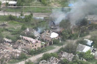 This drone footage obtained by The Associated Press shows the village of Ocheretyne, a target for Russian forces in the Donetsk region of eastern Ukraine. Ukraine’s military has acknowledged the Russians have gained a “foothold” in Ocheretyne, which had a population of about 3,000 before the war, but say fighting continues. No people could be seen in the footage, and no building in Ocheretyne appeared to have been left untouched by the fighting. (Kherson/Green via AP)