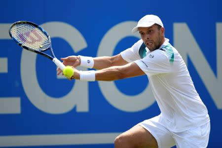 Britain Tennis - Aegon Championships - Queen’s Club, London - June 21, 2017 Luxembourg's Gilles Muller in action during his second round match against France's Jo-Wilfried Tsonga Action Images via Reuters / Tony O'Brien