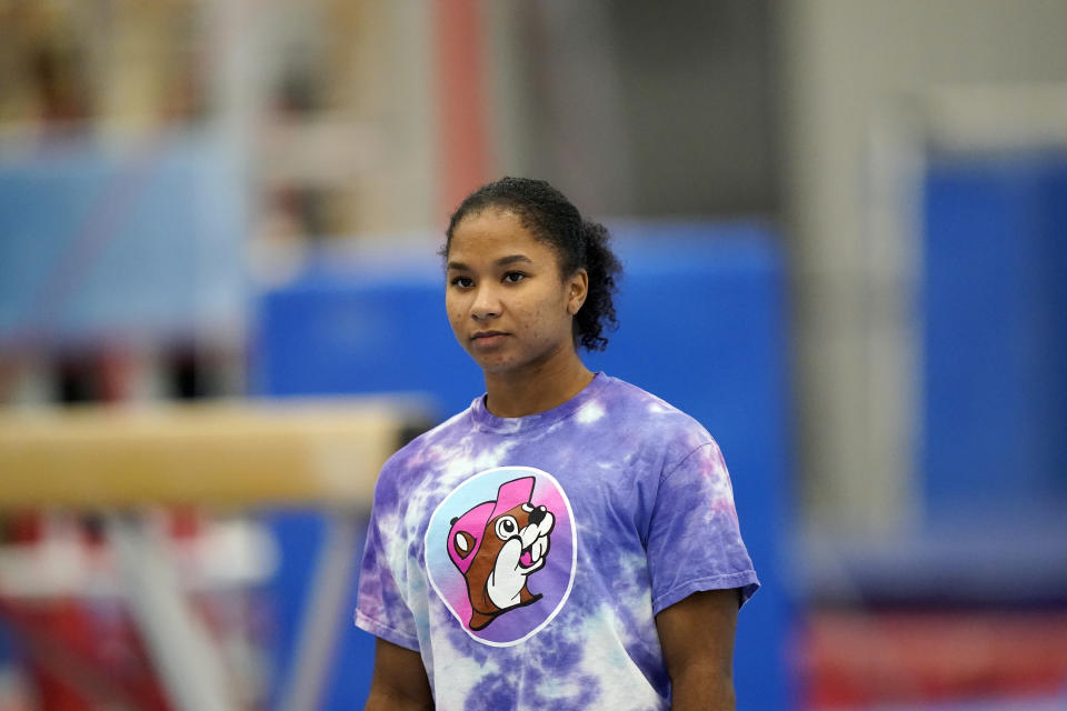 FILE - In this May 11, 2021, file photo, gymnast Jordan Chiles trains in Spring, Texas. Three years ago, Jordan Chiles wasn't sure she wanted to be a gymnast anymore. A move to Texas, a dash of maturity and a renewed confidence in herself have the 20-year-old on the cusp of earning a spot on the U.S. Olympic team. (AP Photo/David J. Phillip, File)