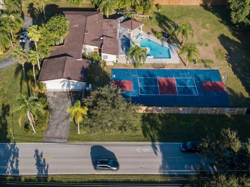 An aerial view of the home in the 7100 block of Southwest 62nd Street on Monday, Oct. 10, 2022, in Miami, Florida. The home is where the University of Miami chapter of Sigma Phi Epsilon hosted a pool party on Oct. 1 after which a video surfaced showing frat brothers chanting about having sex with a dead woman.