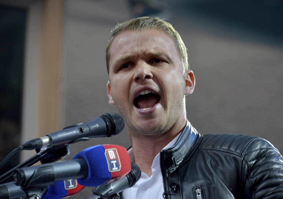 Drasko Stanivukovic, the town’s mayor who is an opposition leader, speaks during a protest against the government in Banja Luka, in Serb-dominated part of Bosnia, Saturday, Oct. 2, 2021. Several thousand people have rallied against the government in Serb-dominated part of Bosnia. The protesters on Saturday accused the ruling party of nationalist leader Milorad Dodik of crime and corruption and called for its ouster. (AP Photo/Radivoje Pavicic)