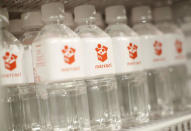 Mercari-labbeling bottles of waters are dislayed at the company's Tokyo headquarters in Tokyo, Japan, June 15, 2018. Picture taken June 15, 2018. REUTERS/Issei Kato