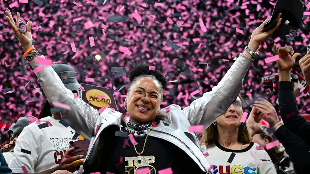 cleveland, ohio april 7 head coach dawn staley of the south carolina gamecocks celebrates on stage after defeating the iowa hawkeyes during the ncaa womens basketball tournament national championship at rocket mortgage fieldhouse on april 7, 2024 in cleveland, ohio photo by ben solomonncaa photos via getty images