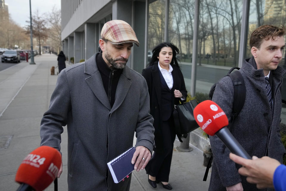 Cesar De Castro, attorney for Genaro Garcia Luna, Mexico's former top security official, arrives to Federal court in Brooklyn, Tuesday, Jan. 17, 2023, in New York. Luna goes on trial on charges of helping the Sinaloa Cartel traffic drugs and protect them from capture while he was serving as Mexico’s top security official. (AP Photo/John Minchillo)