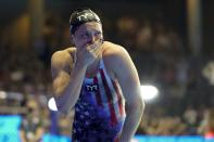 Annie Lazor reacts after winning the women's 200 breaststroke during wave 2 of the U.S. Olympic Swim Trials on Friday, June 18, 2021, in Omaha, Neb. (AP Photo/Jeff Roberson)