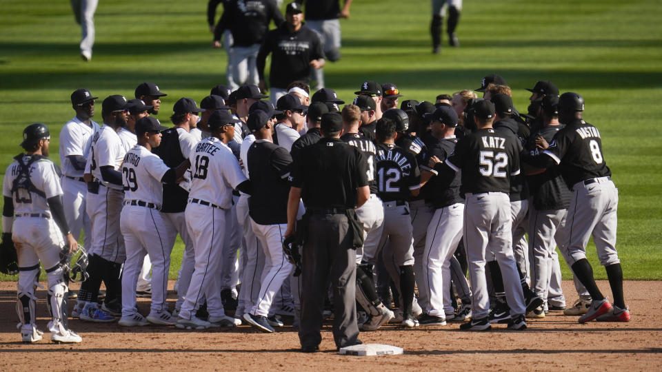 Detroit Tigers and Chicago White Sox benches clear in the ninth inning of a baseball game in Detroit, Monday, Sept. 27, 2021. (AP Photo/Paul Sancya)