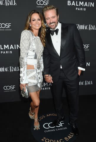 <p>Gilbert Flores/Variet</p> Scott Rigsby and Brooke Burke attend the Zodiac Ball in Los Angeles on Sept. 28, 2023
