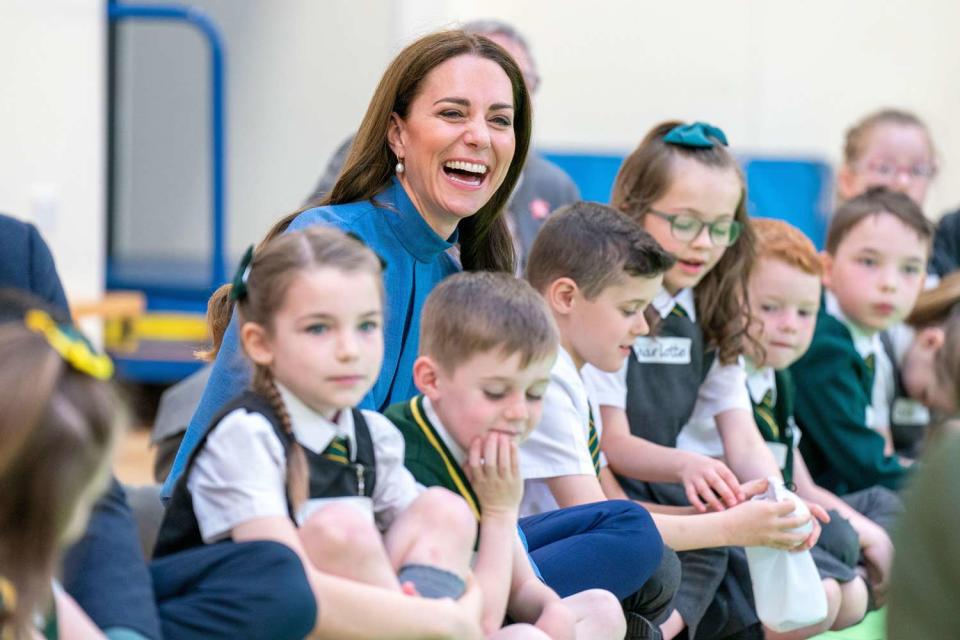 The Duchess of Cambridge with P3 pupils during a visit to St. John's Primary School, Port Glasgow