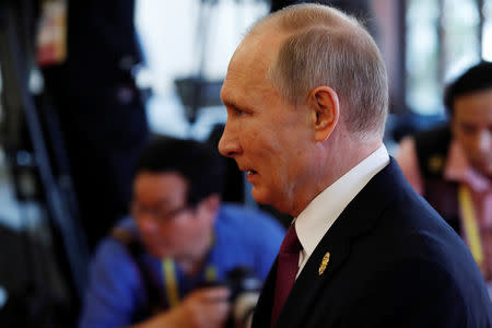 Russia's President Vladimir Putin attends the APEC Business Advisory Council dialogue during the APEC summit in Danang, Vietnam November 10, 2017. REUTERS/Jorge Silva