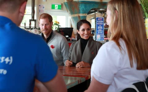 Prince Harry, The Duke of Sussex with Meghan Markle the Duchess of Sussex meet young people from a number of mental health projects operating in New Zealand, at the Maranui Cafe in Wellington - Credit: Reuters