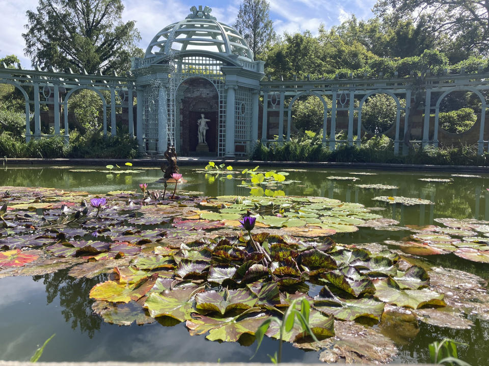 This image provided by Justine Damiano shows the lily pond at Old Westbury Gardens in Old Westbury, NY, one of more than 350 public gardens and arboretums whose admission is included with a membership in the American Horticultural Society. (Justine Damiano via AP)