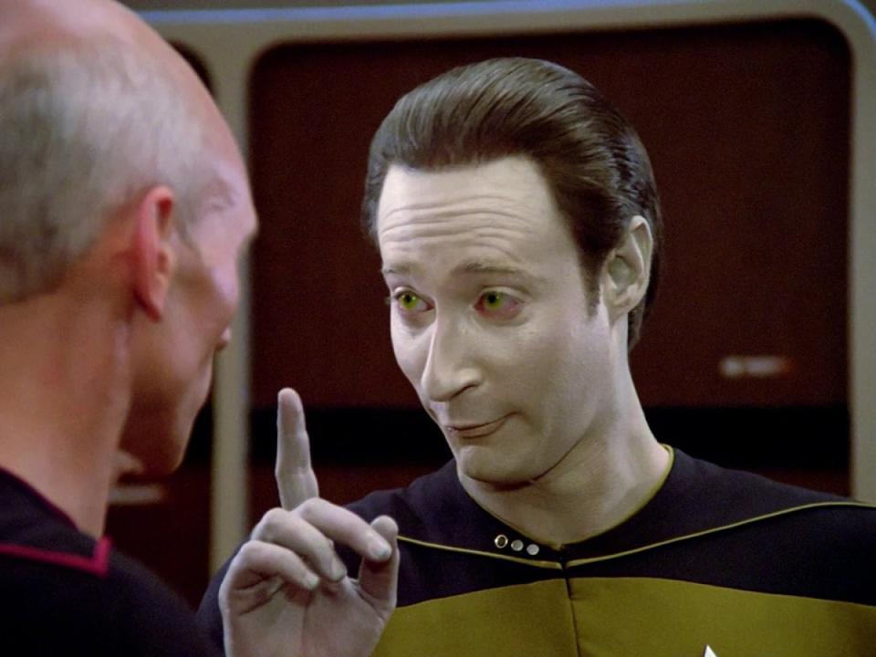 An intoxicated Data chats up Captain Picard in "The Naked Now," the second episode of Star Trek: The Next Generation.