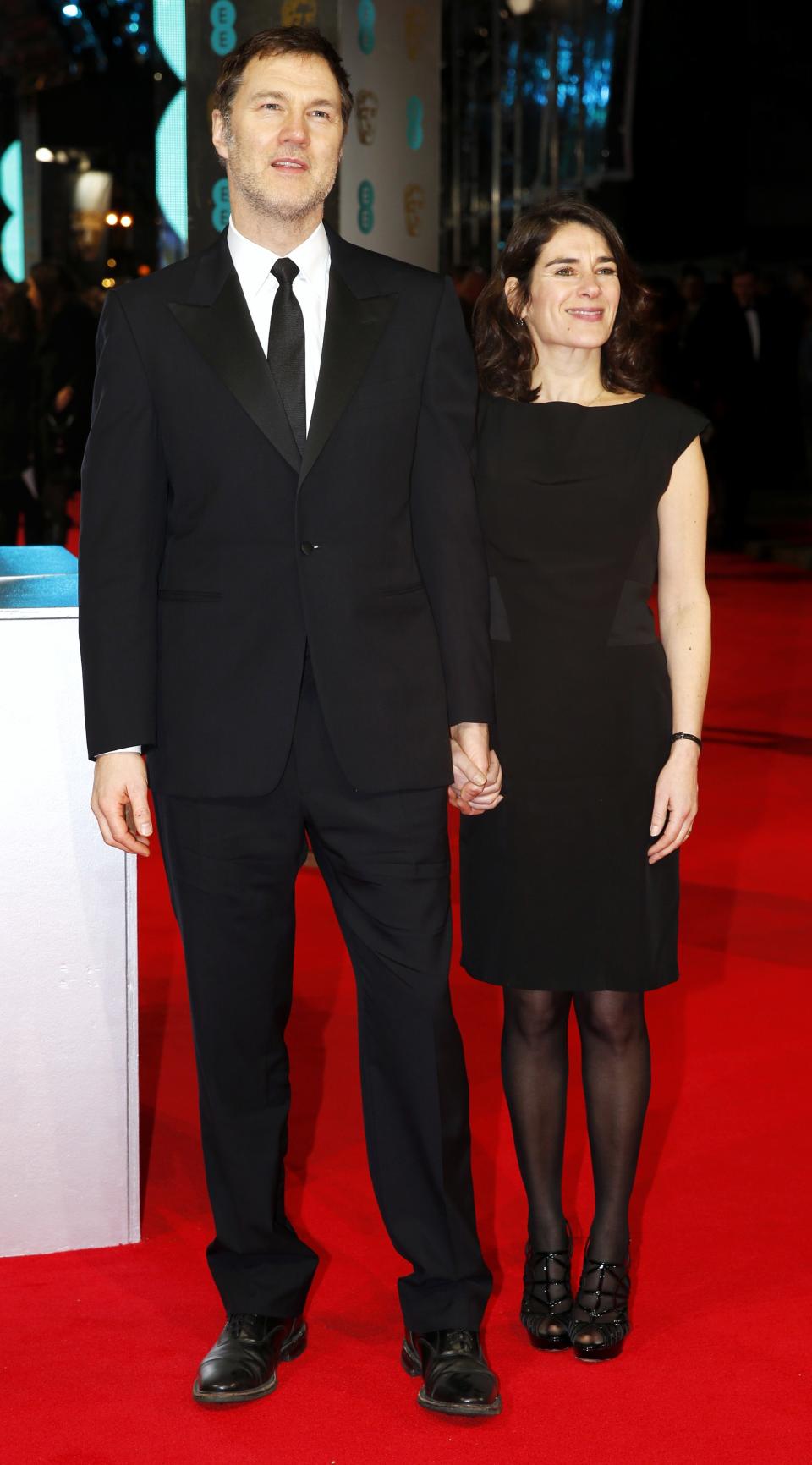 Actor David Morrisey and writer Esther Freud arrive at the British Academy of Film and Arts (BAFTA) awards ceremony at the Royal Opera House in London February 16, 2014. REUTERS/Suzanne Plunkett (BRITAIN - Tags: ENTERTAINMENT)