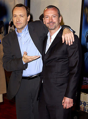 Kevin Spacey ponders karate chopping Iain Softley at the Westwood premiere of K-Pax