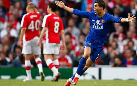 Cristiano Ronaldo celebrates scoring against Arsenal - Credit: reuters