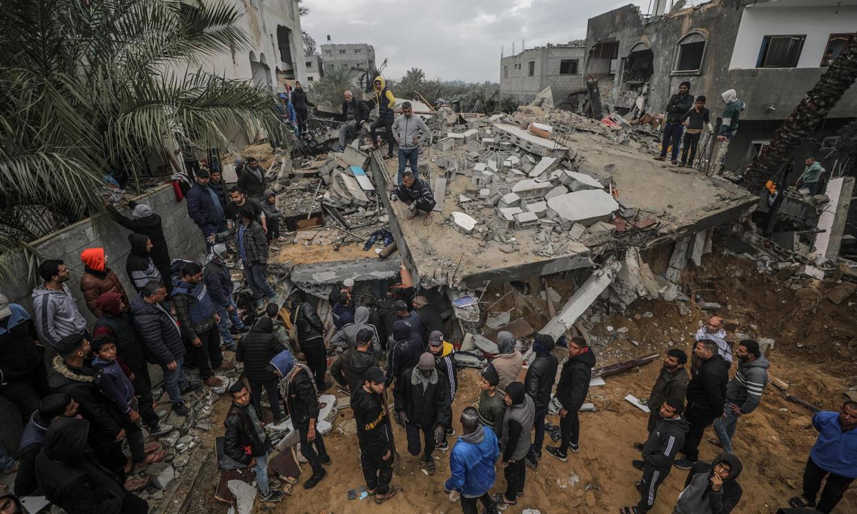 <span>Palestinians searching for survivors after Israeli airstries in Deir al-Balah, Gaza, last month.</span><span>Photograph: Mohammed Saber/EPA</span>