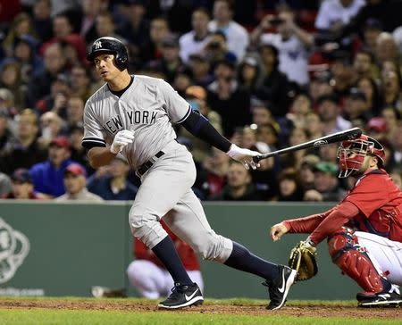 May 1, 2015; Boston, MA, USA; New York Yankees pinch hitter Alex Rodriguez (13) hits a home run tying Willie Mays record for most home runs during the eighth inning against the Boston Red Sox at Fenway Park. Mandatory Credit: Bob DeChiara-USA TODAY Sports
