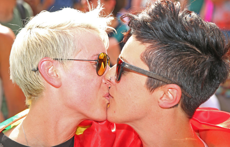 Rebecca Davies (left) and her partner, Paula Van Bruggen, kiss in Melbourne as the results of the poll on legalizing same-sex are announced. (Photo: Scott Barbour via Getty Images)
