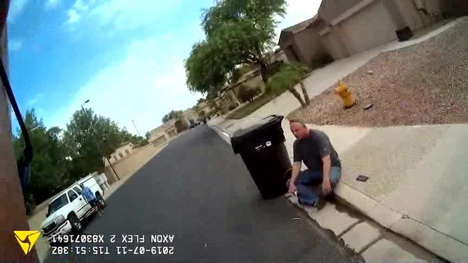 Alex Cox talks with police after shooting Charles Vallow. / Credit: Rexburg Police Department