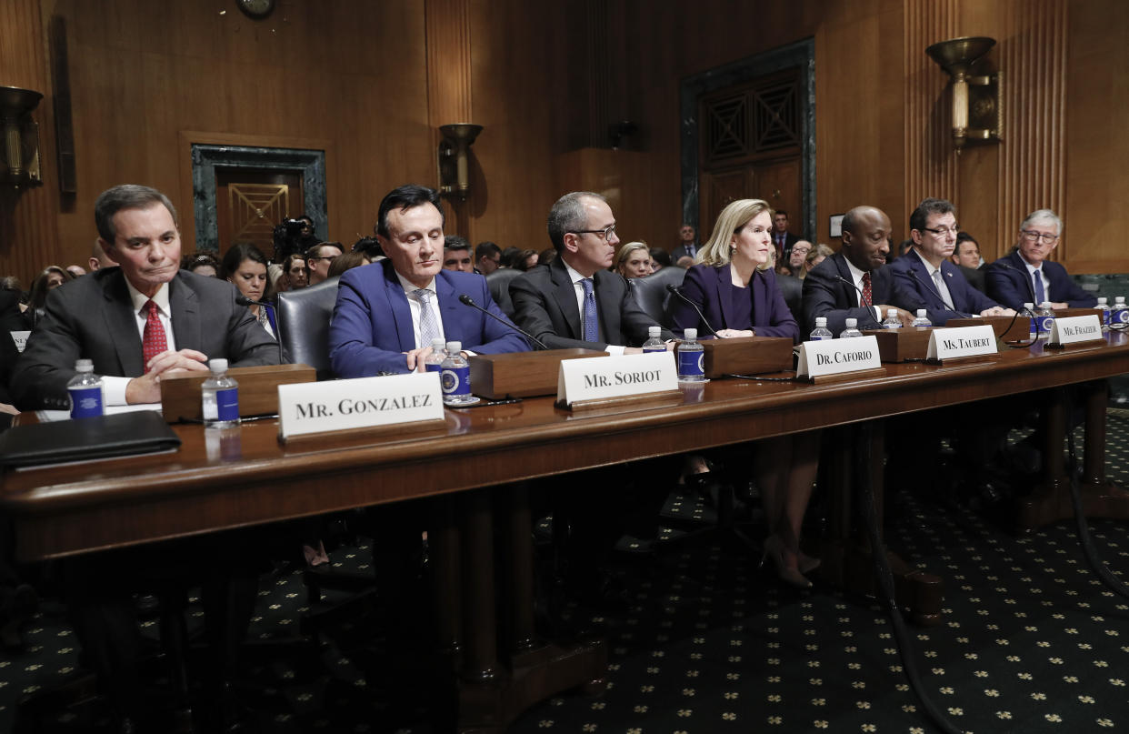 From l-r., Richard A. Gonzalez , Chairman and Chief Executive Officer AbbVie Inc., Pascal Soriot, Executive Director and Chief Executive Officer AstraZeneca, Giovanni Caforio, M.D. Chairman of the Board and Chief Executive Officer Bristol-Myers Squibb Co., Jennifer Taubert, Executive Vice President, Worldwide Chairman, Janssen Pharmaceuticals Johnson & Johnson, Kenneth C. Frazier, Chairman and Chief Executive Officer Merck & Co., Inc., Albert Bourla, DVM, Ph.D. Chief Executive Office Pfizer, Olivier Brandicourt, M.D. Chief Executive Officer Sanofi, wait to testify before the Senate Finance Committee hearing on drug prices, Tuesday, Feb. 26, 2019 on Capitol Hill in Washington. (AP Photo/Pablo Martinez Monsivais)