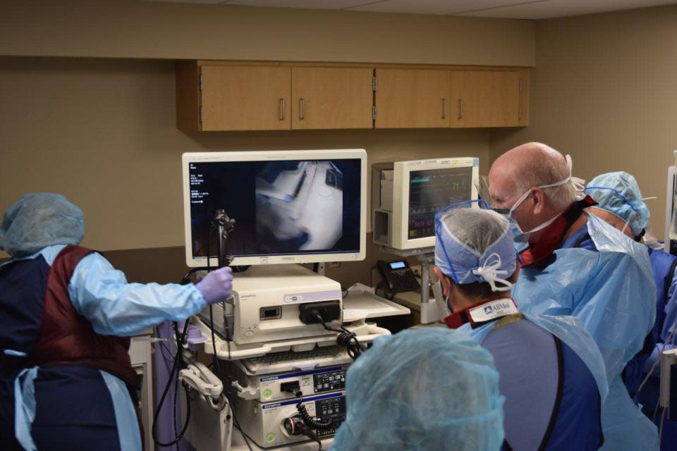 Dr. Craig Shapiro with Pueblo Pulmonary Associates (second from left) prepares to use the hospital&#39;s new lung scoping technology on a patient at Parkview in Pueblo.