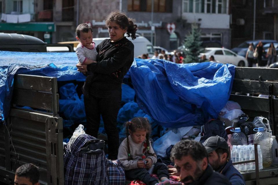 PHOTO: Armenian refugees wait in a square of Goris city centre on Sept. 29, 2023 before being evacuated in various Armenian cities. (Alain Jocard/AFP via Getty Images)