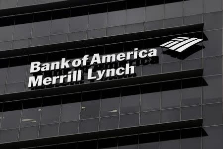 A Bank of America Merrill Lynch sign is seen on a building that houses its offices in Singapore May 17, 2012. REUTERS/Tim Chong/File Photo