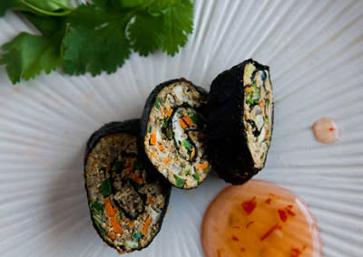 <div class="caption-credit"> Photo by: Photo by Kimberley Hasselbrink</div><b>Crunchy Beef Nori Rolls <br></b> <br> Combine ground beef with finely chopped shallots, shredded carrots, finely chopped reconstituted and drained dried mushrooms (or cooked shiitake mushrooms), grated fresh ginger and enough beaten egg to form a sticky mixture. Spread in a thin, even layer on a sheet of nori, then roll up tightly to form a roll, brushing the edge with water to seal. Pan-fry immediately, partially covered, in vegetable oil until crisp and the meat is cooked through. Cut the roll on the diagonal into thirds and serve with store-bought sweet chili dipping sauce.