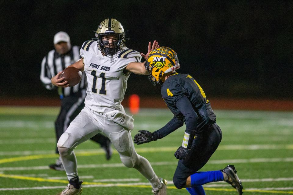 Point Boro's Matt Oliphant runs the ball as SJV's Nick Galamb challenges him during the second half of the Point Pleasant Borough vs. St. John Vianney at St. John Vianney High School in Holmdel, NJ Friday, October 21, 2022.