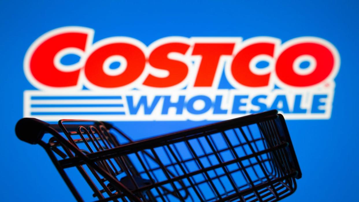 <div>In this photo illustration, the Costco Wholesale logo seen displayed on a smartphone along with a shopping cart. (Photo Illustration by Rafael Henrique/SOPA Images/LightRocket via Getty Images)</div>