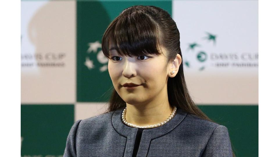 Princess Mako in a grey outfit