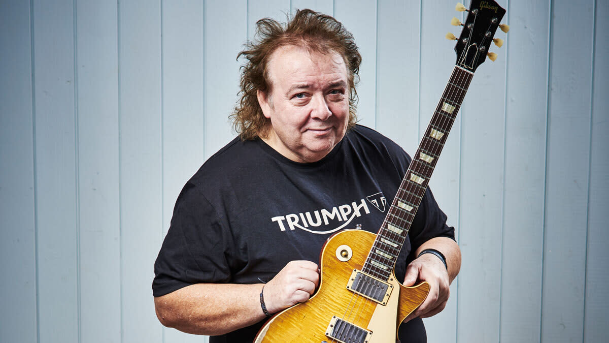  Bernie Marsden holding a Gibson Les Paul 